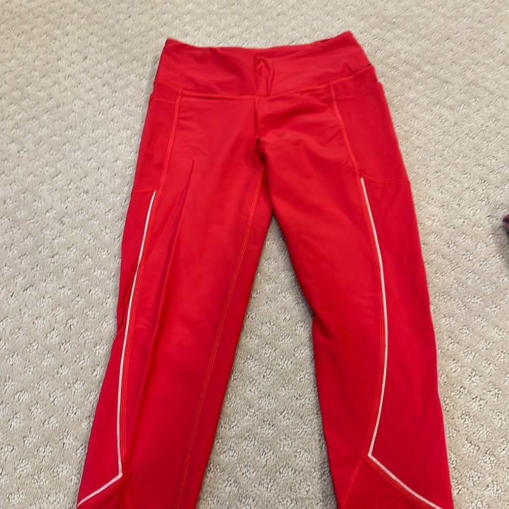 red victoria sport leggings! size small!
